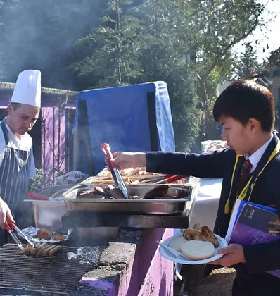 Student involvement in grilling.